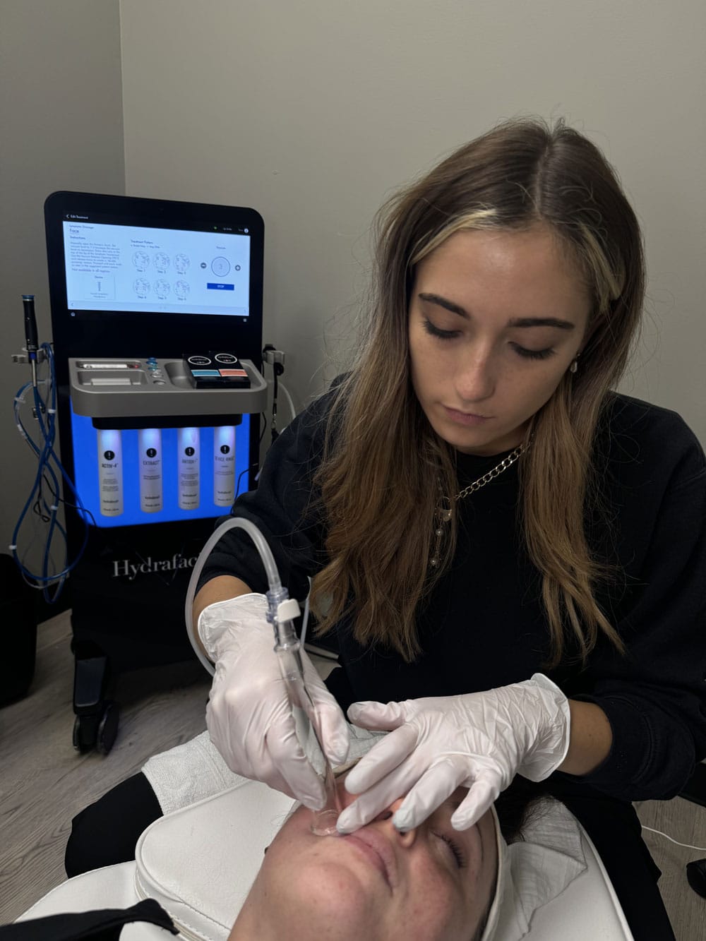 a woman sitting on a table