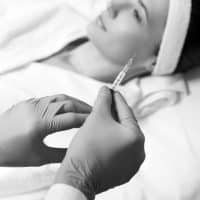 a woman lying on a bed