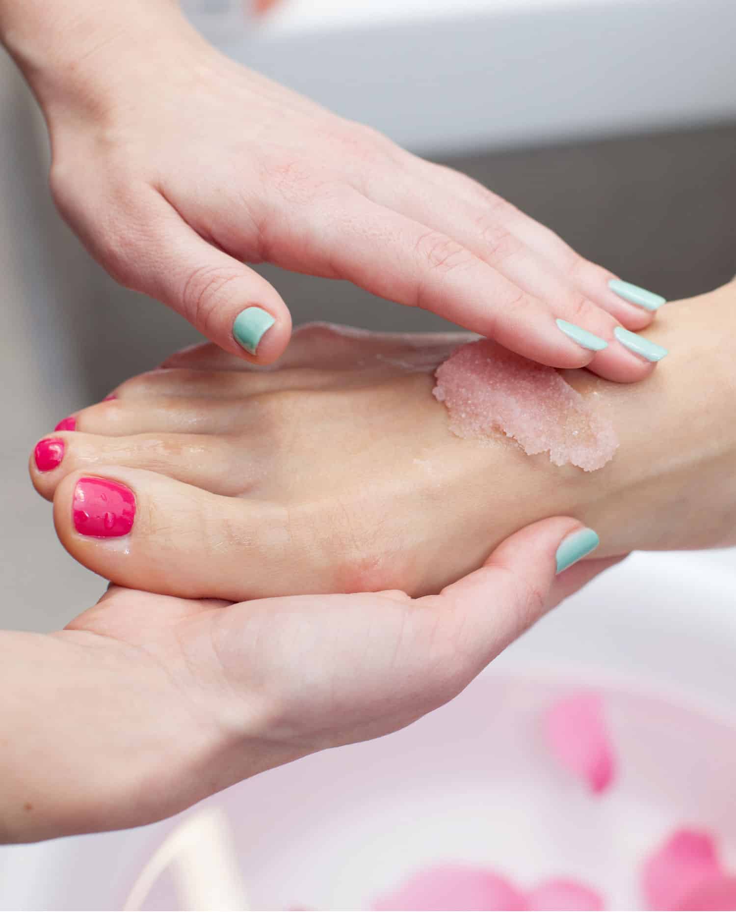 a hand holding a toothbrush